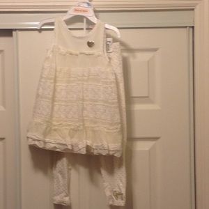 Juicy Couture legging set. It's ivory and gold.